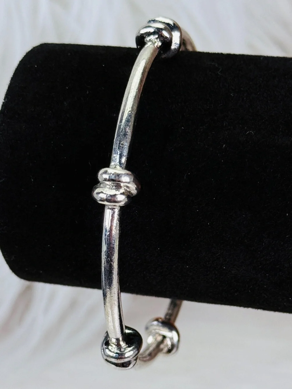 Pretty Silvertone weighted knotted bangle stacking bracelet